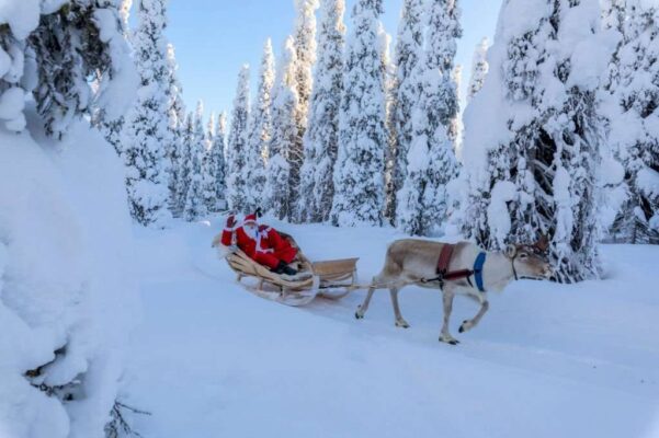 Santa Claus on reindeer sleigh, Lapland, Finland