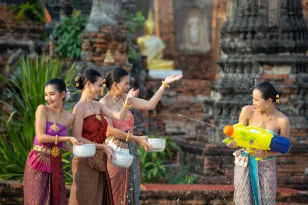Women play water in Songkran festival