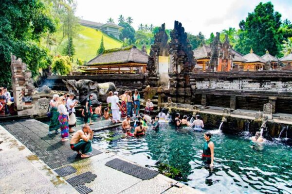 People bathing in the holy spring water at the Tirta Empul temple Ubud, Bali