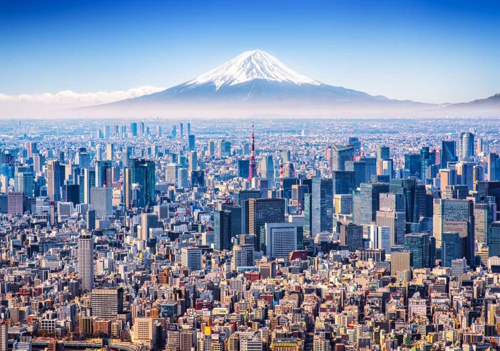 Aerial view of Mount Fuji, Tokyo Tower and modern skyscrapers in Tokyo