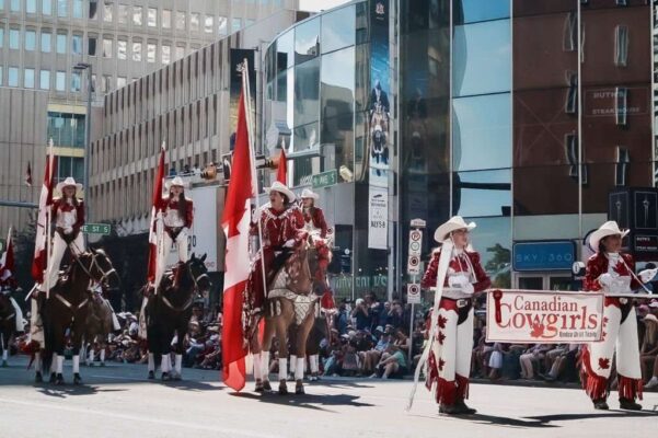 Canadian Cowgirls- Rodeo Drill Team in the (Calgary) Stampede Parade coming through downtow
