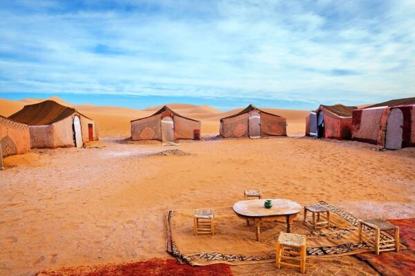 The carpet tents Berber Camp in Erg chigaga, Morocco on a calm day.