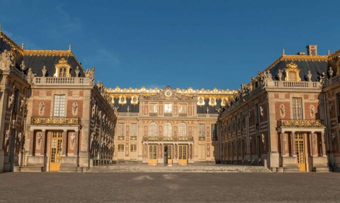 Exterior of the Palace of Versailles before the crowds arrive.