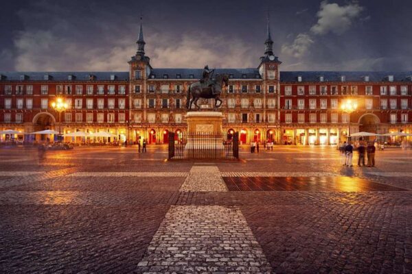 Nighttime at Plaza Mayor, a central plaza in the city of Madrid, Spain