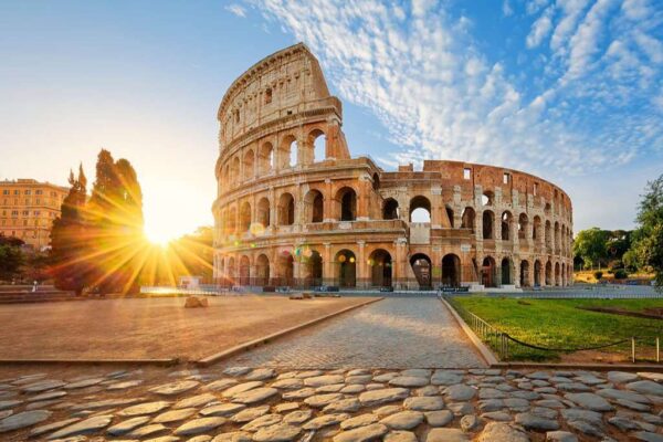 View of Colosseum in Rome and morning sun, Italy