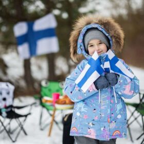 Finnish little girl with Finland flags