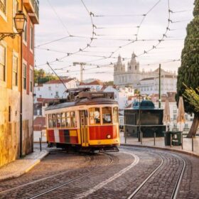 Traditional old tram on the streets of Lisbon old town